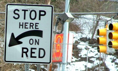 Stop Here On Red Sign