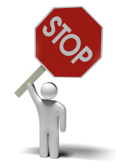 Figure Holding Stop Sign