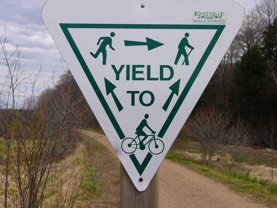 Yield To Bikes, Skiers, Runners Sign