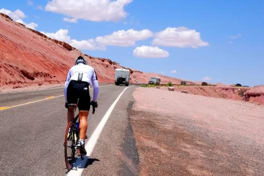 Bicycle Racer On Highway