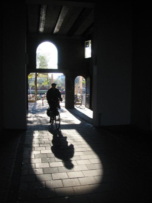 Cyclist With Shadow