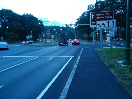 Vertical Bicycle Stop On Line Sign With Pavement Marking