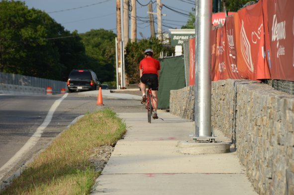 Cyclist On Sidewalk