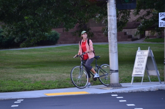 Female Cyclists Using Crossing Signal