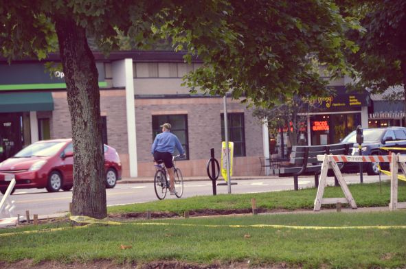 Man Riding A Bike In Newton Centre